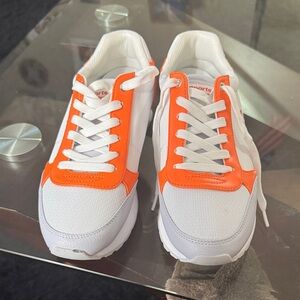 White and Orange Athletic Shoes